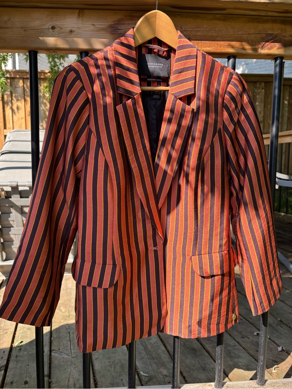 Scotch & Soda Orange and Black Vertical-Stripe Trousers and matching blazer.